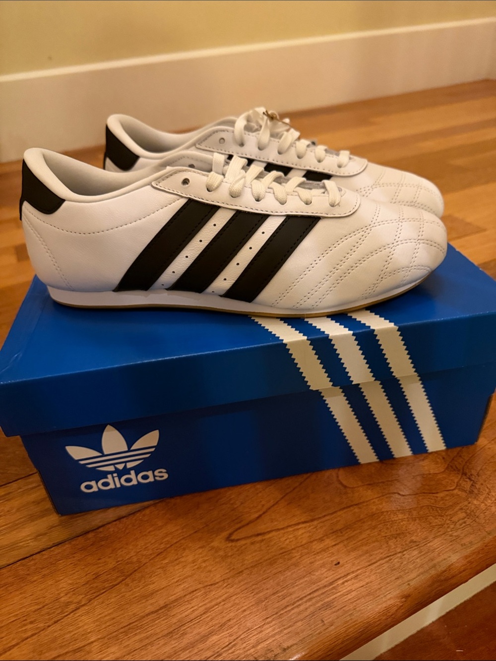 adidas White Sneakers with Black Stripes